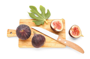 Wooden board with fresh ripe figs and leaf on white background