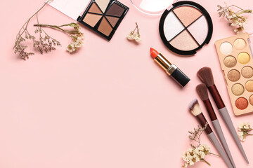 Composition with makeup products and beautiful gypsophila flowers on pink background