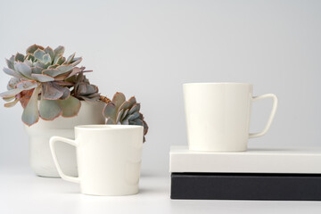 Coffee mug on white office table mock up