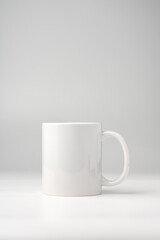 Blank white coffee mug mock up on white background