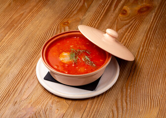 Kharcho soup on wooden background