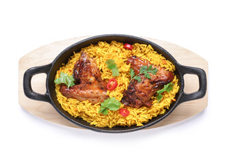 Baking dish of traditional chicken biryani on white background