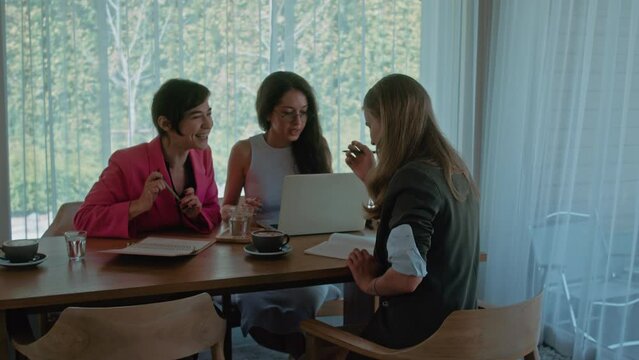 Modern international office. Women's business meetup. 