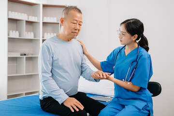 Asian female hands touching senior male hand Helping hands take care of the elderly concept