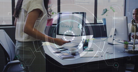 Image of data processing over biracial businesswoman working in office