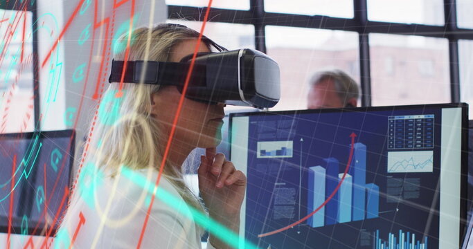 Image of data processing over caucasian businesswoman using vr headset in office