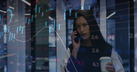 Image of financial data processing over biracial businesswoman in office