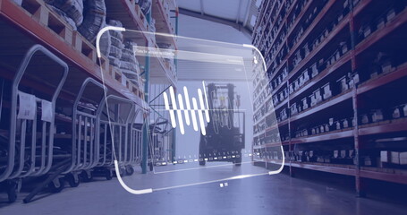 Image of data processing on screen over warehouse