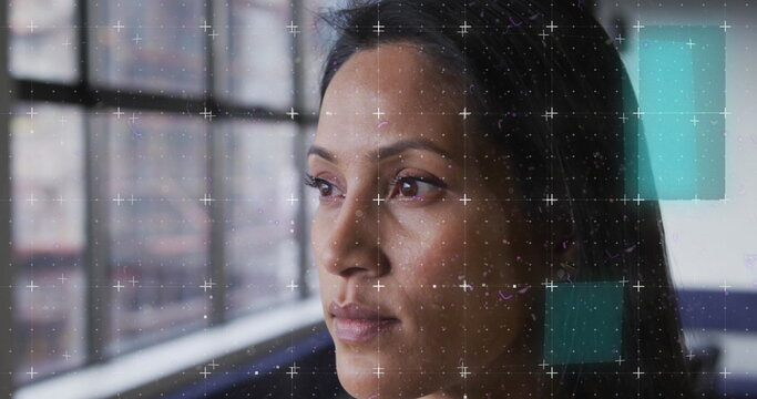 Image of financial data processing over biracial businesswoman in office