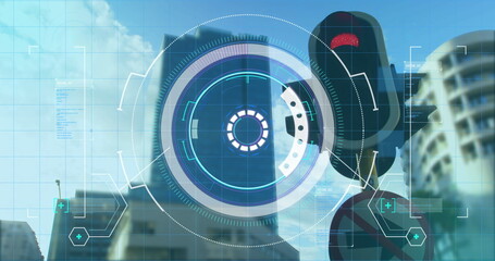 Image of scope scanning and markers moving with cityscape in the background