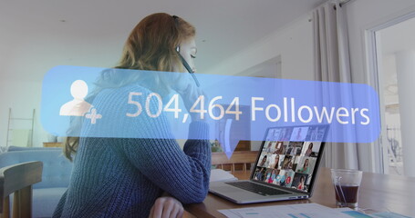 Image of speech bubble with number of followers growing over woman using laptop on image call