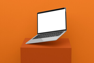 minimalist laptop mockup with blank screen and orange background