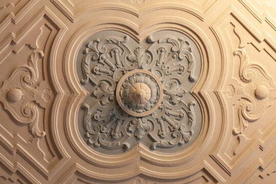 Plaster rosette with a geometric pattern on the ceiling of an ancient manor