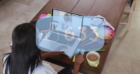 Image of speech bubble with thumbs up and numbers growing over woman using laptop on image call