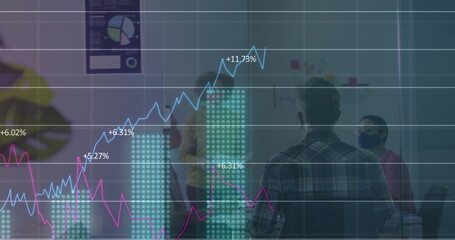 Image of statistics recording over colleagues in office wearing face masks
