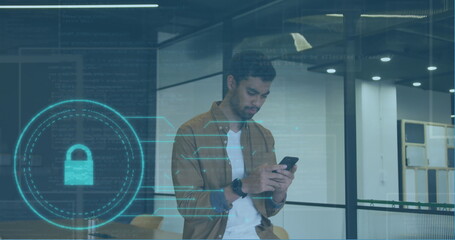 Image of padlock and data processing over biracial businessman using smartphone