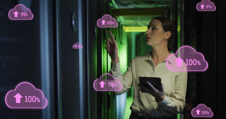 Image of clouds with uploading over caucasian woman working in server room