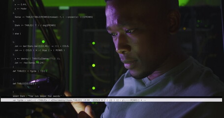 Image of lines and data over african american man in server room