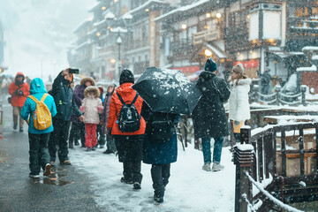 tourist in Ginzan Onsen with snow fall in winter season is most famous Japanese Hot Spring in...
