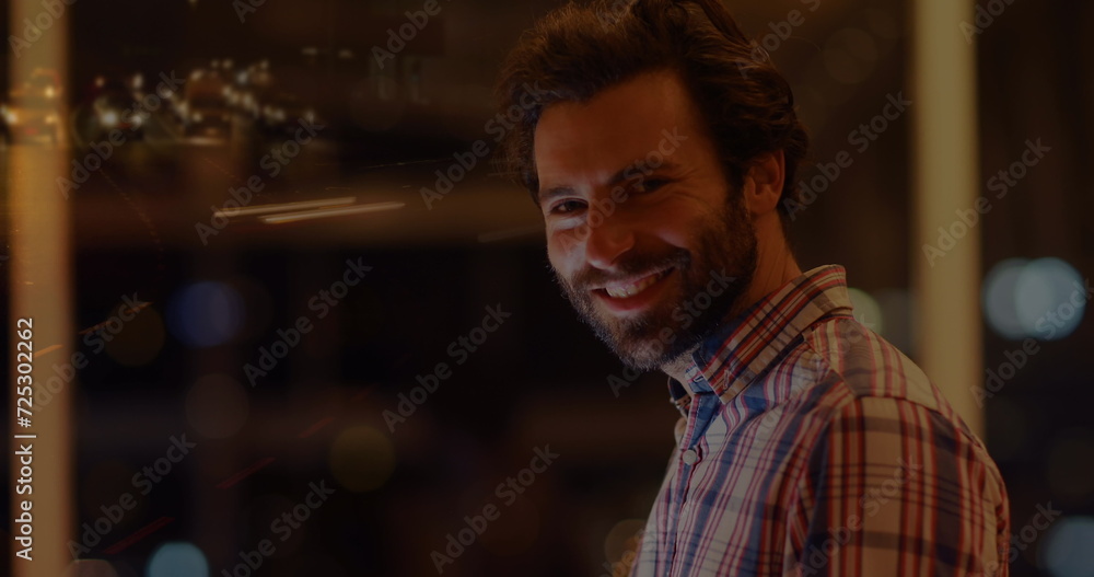 Poster image of caucasian businessman using smartphone over data processing and cityscape