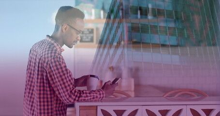 Image of african american businessman using smartphone over data and cityscape