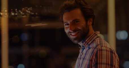 Image of caucasian businessman using smartphone over data processing and cityscape