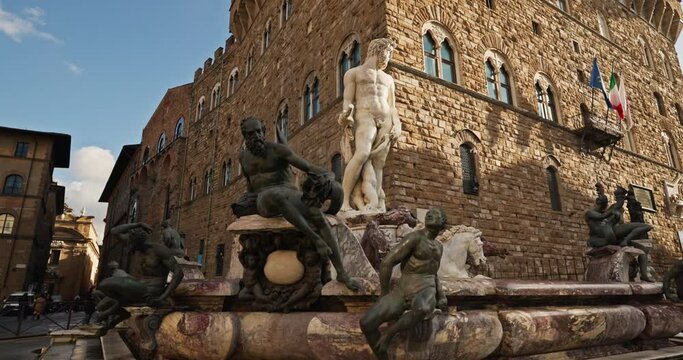 Fountain of Neptune in Florence, Italy. Cityscape with tattoos in the center of the historical city of Italy. High quality 4k footage