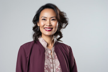 Obraz premium Confident business woman posing in professional attire. Corporate leadership and diversity.
