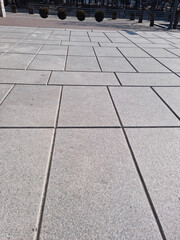 It is a marble sidewalk block floor.