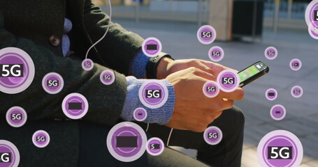 Image of 5g texts over caucasian businessman using smartphone