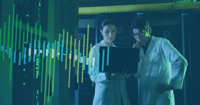 Image of data processing over diverse couple using laptop in server room