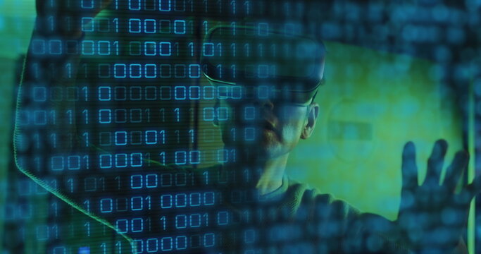 Image of binary coding data processing over asian male it engineer in vr headset