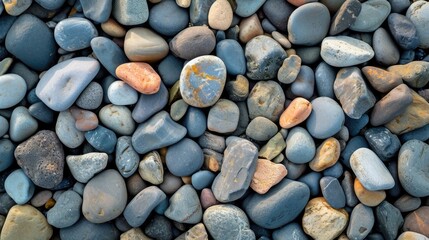Close-up of pebble stones on the shore, creating a natural beach stones background in a top view, Ai Generated