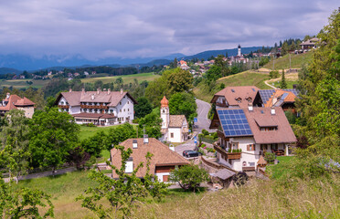Fototapeta na wymiar view of Costalovara: a small village of Collalbo municipality, Bolzano province, South Tyrol, northern Italy, Europe, Juni 13, 2023