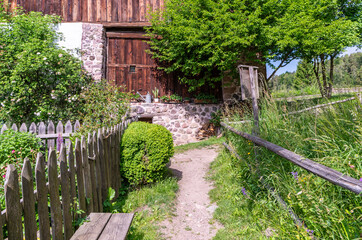 The old Maso Plattner (typical Tyrolean farm), site of the Bees Museum, Costalovara, municipality of Ritten, South Tyrol. Trentino Alto Adige, northern Italy, Juni 13, 2023