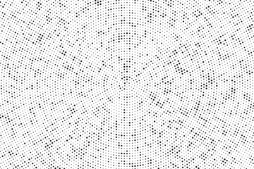 Abstract dotted pop art radial background. Abstract radial halftone texture. Monochrome background of black dots on white.