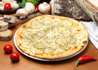 Italian pizza with pear and blue cheese on wooden background