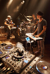 Band, practice and performance of music at stage with people in preparation of production for concert. Sound, equipment and musician in theater ready for creative show with instruments and technology
