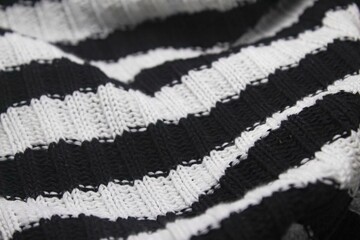 black and white knitted fabric	