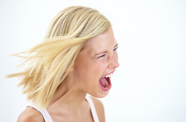Angry, frustrated and profile of screaming woman with stress isolated on a white studio background...