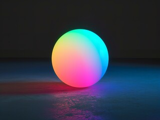 a transparent glass ball resting on a smooth surface. Vibrant rainbow hues reflected from the surrounding area add a touch of color and dimension