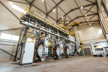 industrial machinery and equipment for the production of eco-friendly wood pellets in a sustainable...