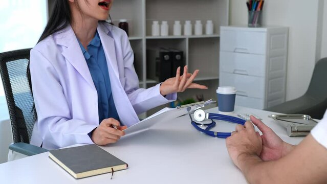 Asian female doctors use a stethoscope to examine a patient, ask for information, give advice, and comfort, and plan a course of treatment and preventive care. concept of the health check.