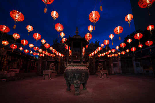 The Chinese Goddess of Mercy temple statues illuminated by lanterns, Georgetown, Penang, Malaysia