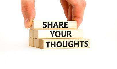 Share your thoughts symbol. Concept words Share your thoughts on beautiful wooden blocks. Beautiful white table white background. Businessman hand. Business share your thoughts concept. Copy space.