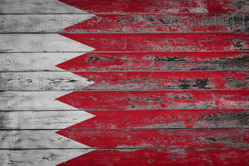 The national flag of Bahrain is painted on uneven wooden  boards. Country symbol.