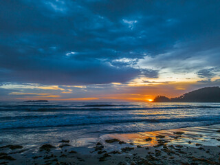 Fototapeta na wymiar Summer Sunrise Seascape with Rain Clouds