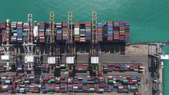 Aerial view from a container drone. Container ships in export-import and logistics business Transporting goods to large ports Worldwide shipping and logistics business International business abroad