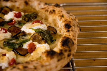 Experience street food by tasting freshly baked pizza made in Naples in multiple flavors and various types