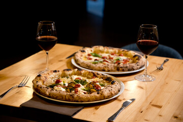 Experience street food by tasting freshly baked pizza made in Naples in multiple flavors and...